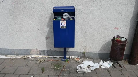 Trash can on the street. A bin full of waste in the city. Stock Footage 247524871