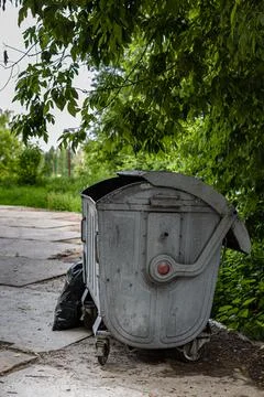 Trash can on wheels with open lid Stock Photos