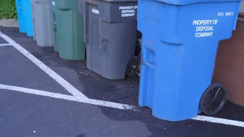 Trash Cans During Trash Day on Parking Lot Stock Footage 238579994
