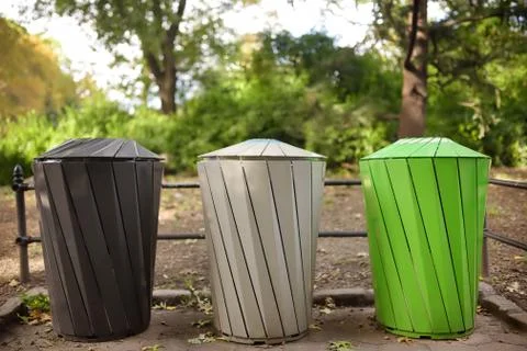 Trash cans for separate recycling garbage in public park. Ecology, recycling, Stock Photos