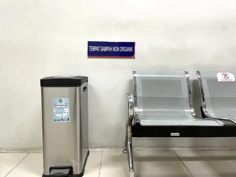 Trash cans for sorting waste. For plastic, glass and paper, medical waste, in ho Stock Photos