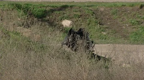 Trash Caught in Brush in Bonner/Milltown Stock Footage 105959187