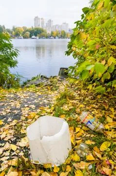 Trash close to the River Фото