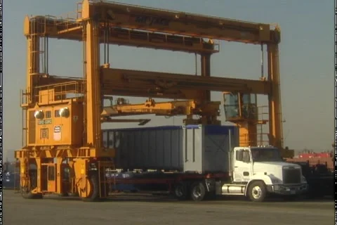 TRASH CONTAINER BEING LIFTED OFF 2 Stock-Footage 1052496