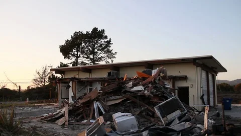 Trash dump and ripped apart building Stock Footage 95114719