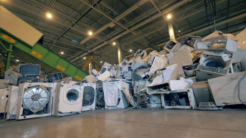 Trash, e-waste, electronic garbage recycling factory. Pile of old washing Stock Footage 135662339