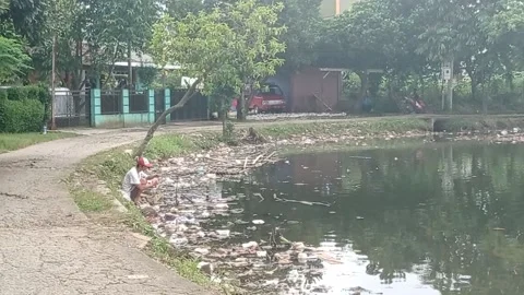 Trash fishing Stock Footage 221395853