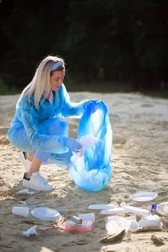 Trash keeper or garbage on the beach. Stock Photos