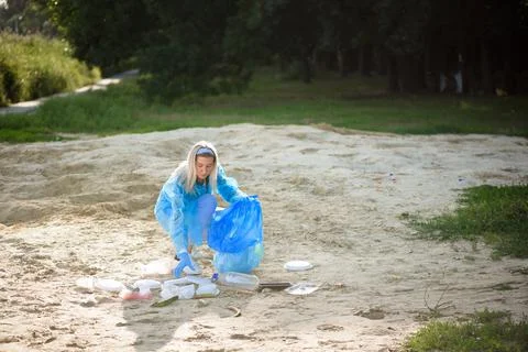 Trash keeper or garbage on the beach. Stock Photos