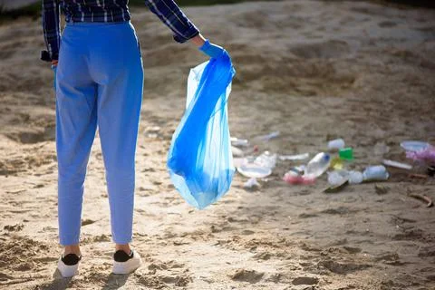 Trash keeper or garbage on the beach. Stock Photos