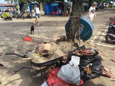 Trash overflowing from bin Stock Photos