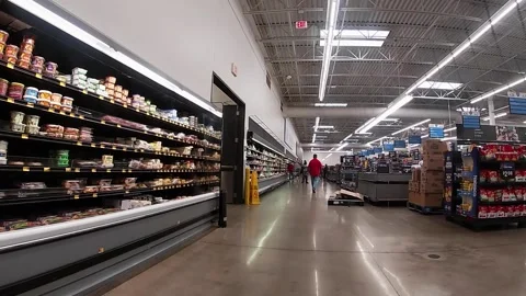 Trash on pallet clutter on the sales floor Walmart retail store interior Stock Footage 157931101