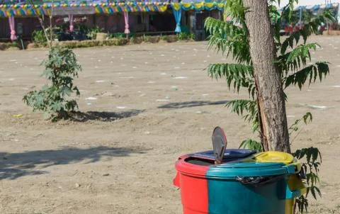 Trash in a park. Stock Photos