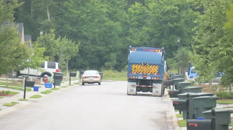 Trash pickup street Stock Footage 25302782