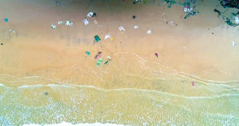 Trash, plastic, garbage, bottle... environmental pollution on the beach 스톡 동영상 113041513
