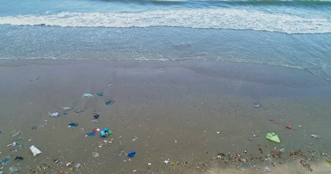 Trash, plastic, garbage, bottle... environmental pollution on the beach Stock Footage 113043932