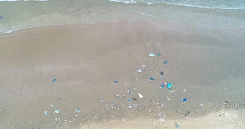 Trash, plastic, garbage, bottle... environmental pollution on the beach Stock Footage 113044705