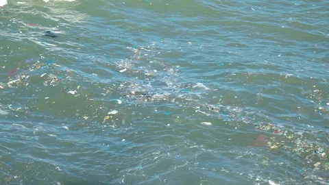 Trash, plastic, garbage, bottle... environmental pollution on the beach - Sea Po Stock Footage 121032151