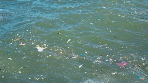 Trash, plastic, garbage, bottle... environmental pollution on the beach Video stock 121032166