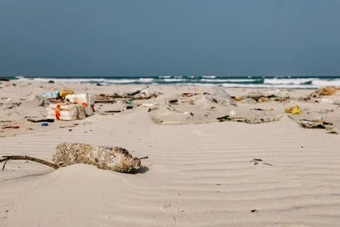 Trash on the sea beach. ecological problem. Environmental pollution. Stock Photos