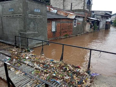 Trash at Small Bridge While Flooding at East Jakarta Indonesia Stock Photos