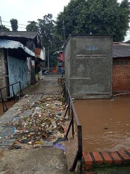 Trash at Small Bridge While Flooding at East Jakarta Indonesia Stock Photos