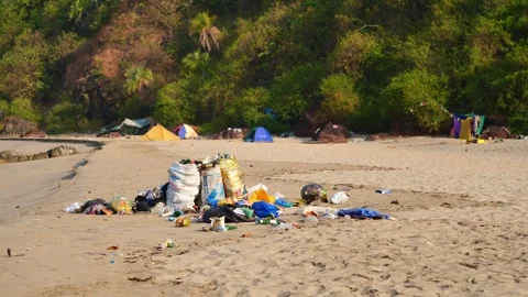 Trash on the tent beach Stock Footage 265876854