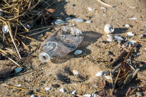 Trash Washed up on a Beach Stock Photos