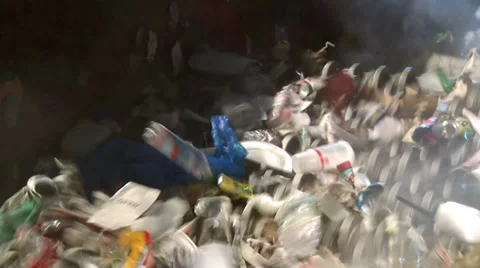 Trash on a wheel conveyor (5 of 8) Stock-Footage 32283564