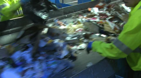 Trash workers on a conveyor (5 of 10) Stock-Footage 32283519