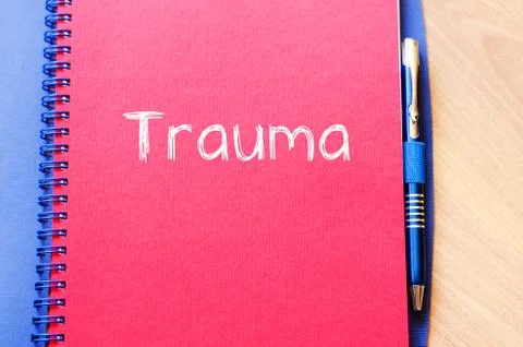 Trauma write on notebook Stock Photos