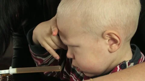 Traumatized child refuses to take syrup Stock Footage 11829979