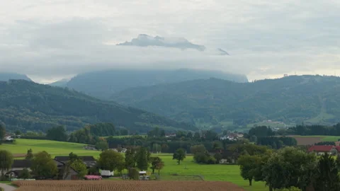 Traunstein mountain panorama with clouds in Laakirchen, Upper Austria Stock Footage 331470258