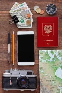 Travel background. Different things you need for journey - smartphone, passpo Stock Photos