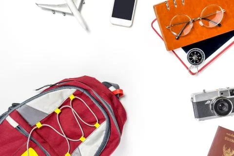 Travel Backpacker is preparing stuff for vacation holiday travel top view Stock Photos