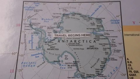 Travel begins here text label placed on map of Antarctica continent concept Stock Footage 346764871