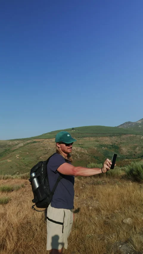 Travel Blogger with Backpack Vlogging While Hiking Stock Footage 345529385