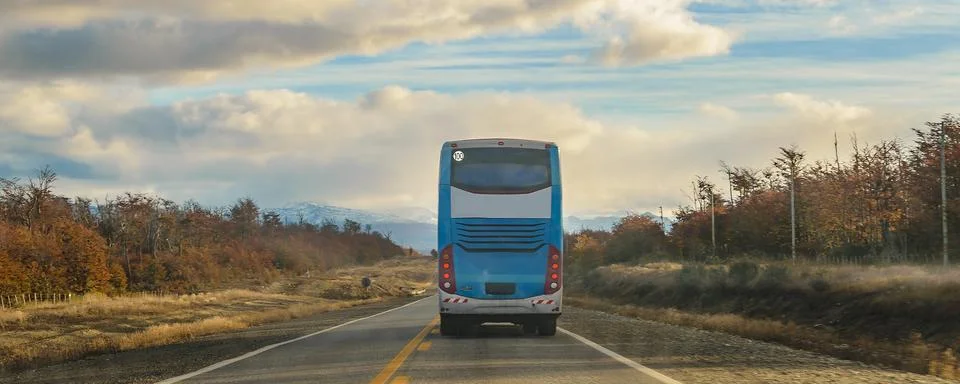 Travel bus at patagonian, forest, tierra del fuego, argentina Stock Photos
