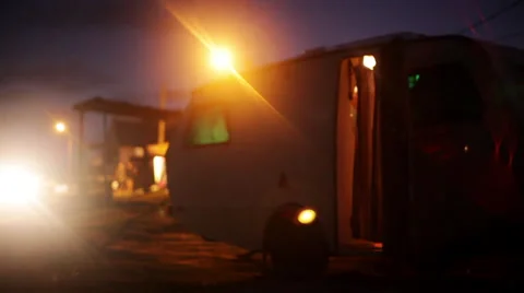 Travel camper at campsite at night Stock Footage