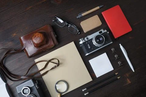Travel concept, retro camera Stock Photos