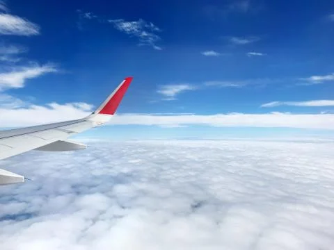 Travel concept, view of clouds from the window airplane with more cloud and.. Stock Photos