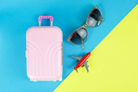 Travel Essentials Get Ready for Your Next Adventure with a Vibrant Suitcase and Stock Photos