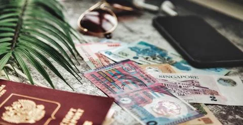 Travel essentials on textured surface Stock-Fotos