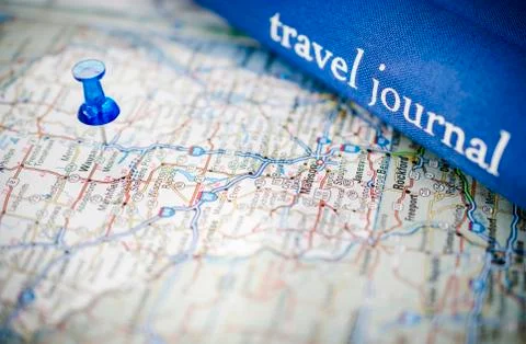 Travel journal and a map Stock Photos
