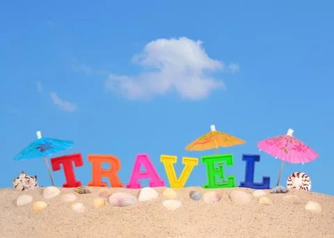 Travel letters on a beach sand Stock Photos