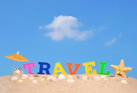 Travel letters on a beach sand Stock Photos