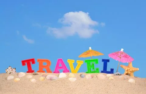 Travel letters on a beach sand Stock Photos