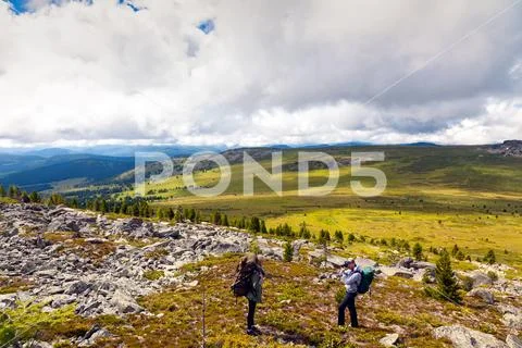 Travel Lifestyle and survival concept rear view. Photographer traveler, enjoy Stock Photos