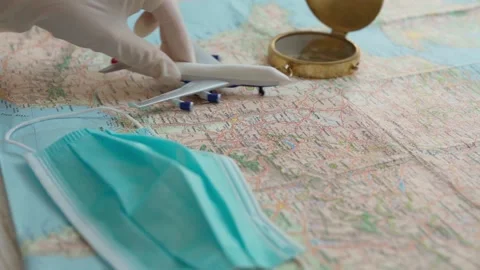 Travel map plane face mask virus quarantine Stock Footage 132335003