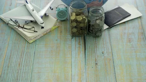 Travel objects on rustic wooden background Stock Footage 146366734